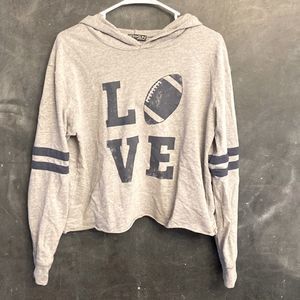 Love football hoodie crop top. Raw hem. Cute stripes and distressed deco.